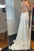 This dress is so gorgeous! I'm super short so the dress was a little long even in 3 inch heels. It was a little tight on my hips since I'm pear shaped but the adjustable back was perfect. This may not be the one I choose, but it's so gorgeous I definitely recommend! - Sarah S.