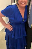 I wore this to a wedding.  The top was a bit big for me as I am not big chested.  I put one of my grandmother's broaches at the "V" to keep it closed.  I loved how comfortable it was!  No sucking in necessary and the sleeve coverage was great.  Basically, it was a dress that covered everything without looking frumpy!  I got tons of compliments and felt very pretty all night. - Leslie L.