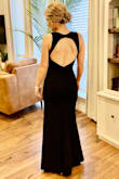 This dress is gorgeous and fits me perfectly. I was very comfortable in it and received tons of compliments. The fabric is high quality and it looked stunning. I had to have about 3 inches hemmed off the bottom and wore it with heels. Overall, I couldn't be happier with it! - Brittany D.