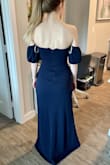 Very beautiful. Thick, stretchy fabric. Hugs in the right places! Great quality and feels like it should stay up at functions without having to tug on it. With heels, the length should be perfect without needing to get alterations. - Heather R.