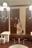 I ordered this dress for a formal gala event and I really liked it at first. It is elegant and shiny and it has a nice fit, besides being super long on me. I didn't have time to have it altered so I had to hold it up when I walked. I'm glad it had adjustable straps for my smaller (34B) bust but I ended up tightening them almost all the way so the little adjuster thing on the strap showed in the front. I got a ton of compliments on the dress and did feel pretty in it. Although by the end of the event I was ready to take it off and never wear it again. The mesh layer material is a little scratchy against my arms and ankles. It also had a hole in the side seam, not sure if it came like that or if it ripped from me holding the dress up for a few hours. - Joslyn R.