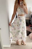 I bought this set for my bridal shower and I think it is the cutest spring set!!!! The medium was perfect for my top and hips, slightly big on the waist. - Jessica K.