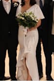 I chose this dress for my civil marriage ceremony. It was elegant, covered arms in a cute way, a bit too slim in the waist, so you should have a perfectly flat stomach, or don't care about some imperfections. - Mariia A.