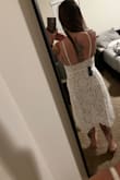 Perfect a-line cut. I've gained some weight and it really covers most problem areas. Tight and fitted in the bust and waist and then loose the rest of the way down. I think it will be perfect for my bridal shower! - Jamie B.