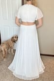 Love this dress! Especially the flowy bottom and cut out back! A little long for 5'7" but heels fix that. The top is a little thinner of material than I would prefer but not going to stop me from wearing to my bridal shower! - Megan R.