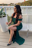 This dress was everything! Everyone loved it and the color is very popular right now. I did wear spanks to keep everything smooth looking and I didn't get it hemmed, just wore 5-inch heels, I went off the reviews to order my size! - Angie E.