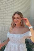 I wore this for my bridal shower and was IN LOVE! It was so cute and fit perfectly. I wore pretty high heels and still felt it was long enough as well! - Zoe H.
