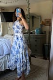 I bought this dress for summer events and I love it! The fabric is nice however I docked off one point because it's so wrinkly and high maintenance. I already washed and steamed it once and it's already wrinkled again just from sitting in my closet. However it's beautiful and I love the halter design and cutout at the waist - Ashley D.
