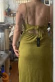 This dress is perfect for summer and the faux wrap helps hide the tummy even after a big meal! The back was a little loose but I'd rather feel comfortable than it be too tight. And ultimately the color is the best thing about this dress! So flattering! - Elizabeth W.