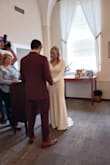 I've had quite the adventure with this dress. I knew from the moment I saw it online it was the dress I wanted to wear for my civil ceremony. I ordered the medium originally and thought I was good to go. A few weeks before the event I realized it hugged me too tightly in the midsection, even with shapewear. It was perfect on my back, butt, and chest. I ordered the large and had it altered to be shortened. The sleeves could have been altered too but I had limited time. I wore a waist trainer on the day of from Skims. It showed occasionally from the back. I also wore a bow from Lulus in my hair. All in all, this was my dress. It hugs the body for better or worse. I'm just thankful it all worked. I have long legs and a larger chest. Even with the lining underneath it just wasn't forgiving on midsection is the only thing I would say when considering sizing. - Sarah R.