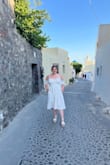 I ordered this dress for my honeymoon in Greece. The fabric is a bit stiff and heavier than I expected, and there were gaps in between the buttons in the bust area even though I don't have a very large chest. I wasn't even wearing a bra.  I ended up sewing in hidden snaps in between the first three buttons so that I could keep it and wear it. - Becky D.