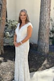 This dress was perfect for my JP wedding! I did have to get it hemmed a little since I was wearing 3 inch heels. It was a little loose in the stomach area but I wanted it that way. This dress is definitely worth the price! All my family gave me huge compliments and said it was perfect! - Dena B.
