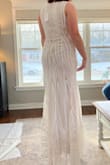 Ugh, I love this dress. It's so gorgeous!! The main reason I didn't go with this one was simply because it doesn't fit the vibe of my venue. It would be great for a 20s-themed wedding! I still love it though and it was surprisingly comfortable! I don't typically expect dresses with a lot of sequins to be comfortable, but it had a nice amount of give/stretch to it. - Christiane L.