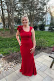 I received lots of compliments on this dress. I normally wear a medium but the large fit better. - Alison S.