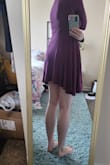 I was REALLY excited for this dress but when I put it on, the hem was super weird... the sides are longer than the front and back and at first I wondered if it was intentional? But one of the sides is pretty uneven compared to the other, so I don't think so. I cannot wear the dress as it is super noticeable, even by others, when I wear it and it also just makes it way too short behind and in front -- definitely in danger of flashing somebody if there is a gust of wind! Besides the hem, the fit was fine and it was comfy and I LOVED the color. I normally love Lulus and this is the first flawed product I have received from here. Just a shame to not be able to wear this dress because of the weird hem :'( - Jeanne R.