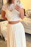 It's beautiful and great quality. It is loose on me up top, I ordered a Medium, and my bust is 34B so I plan on having some alterations as well as taking a little bit off the skirt. This dress will be perfect for my beach wedding. - Brooke S.