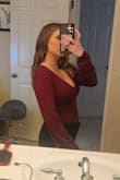 Very comfortable and soft- I love this top. I'm usually a small so I ordered a small. Slightly tight in the length/torso. Fit nicely elsewhere. 

If you have a long torso I'd size up. I have a short torso but the top still pulled down tight so my cleavage was very out. My chest isn't that big and I kept having to pull the shirt up so my cleavage wasn't completely out. 

Still very happy with this top and have it in 3 colors :) If you don't like low-cut tops on your cleavage, I wouldn't recommend or size up. - Kaitlyn L.