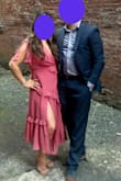 I've used this dress for my engagement photos and as a wedding guest. It's not a stretch material, especially with the zipper around the side/torso area. But it fits one perfectly. Especially for being a short girl, I like how the length fits. I went with a size up so a large. - Midori M.