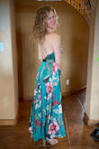 I bought this dress for a beach wedding in Hawaii and it did not disappoint!  The color is gorgeous, the feel is amazing, and the cut is perfect!  I won't even have to wear a bra with it.  It just hugs in all the right places.  I had to get it hemmed (like 5 inches cut off the bottom), and I had the front sewed up a little bit because it was a little low for me.  But just absolutely beautiful!  To put this in perspective, I am pushing 50 and this dress made me look amazing! - Claire A.