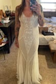 Chose this for my beach wedding ceremony. Mermaid vibes and is going to sparkle so pretty by the water. I may fix the straps to be straight Instead of crisscrossed, and add a bit of fabric to create a slight train, but other than that it's perfect. - Monik L.