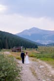 I cannot say enough about this dress. It is absolutely beautiful in person and looks WAY more expensive than it is. The top is heavy and the bottom is super light and airy. I did have to get it altered, but only to shorten it which is to be expected. I wore it to our elopement where we were married in the National Forest and then hiked THREE miles. It held up through all of that and there were absolutely no issues. We then went to a brewery and I was able to sit without it falling down or bunching weirdly, etc.
After that, I had it shortened to above the knee and wore it to our party a year later with our friends. I wish I had more events to wear this dress to because it is just that amazing. This is the one item that I am most obsessed with by Lulus and I have received so many compliments and told people that this brand is absolutely amazing.
Thank you Lulus for helping me have the perfect dress to marry my perfect husband :) - Amanda H.