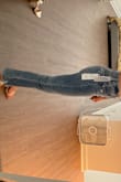 High-waisted and doesn't bulge at the waist. The jeans are so cute I'm obsessed - Ariel P.