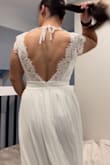 I love the dress! I just have to cut a few loose strings and probably wear white/tan under since it's a bit see-through. But for the price (and me only wearing it for 2 hours) I think it's worth it! Definitely will have to hem a few inches off the bottom even with heels, but that's nothing new to me. Slit is there- but I had my work pants on under for these so I didn't add. - Jamecia N.
