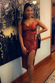 I wore this dress to a New Year's Eve party. I love the dress! The dress Fitted perfectly, the slit is not too high and the color and sequins were great for the occasion. I did wear a strapless bra as the straps are not adjustable. The dress is very comfortable and sexy without being too revealing; I wore the dress with opened heels. - Nessa M.