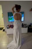 This dress is beautiful, the tail is super cute, good material, and quality and it comes super nicely packed, it comes with its bag to store the dress. The color is beautiful. I am a very happy good choice - Diana B.
