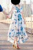 I'm obsessed with this dress. It looked so good for our engagement photos. The top was a little big and the waist has no stretch. Wasn't an issue, just something to be aware of! The bottom half is a perfect level of flowy and the colors photograph great. Definitely recommend! - Danielle L.