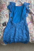 My busy is larger than a typical Large. So if it fits in the bottom, the top tends to be too tight. I love the color and lace material, though! - Gabrielle N.