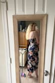I love this dress! It fits well - a tiny bit tight for me, but I wouldn't change my size. I spoke with an employee about the size as I'm typically between S and M, and she recommended S, which was right! M would definitely be too big for me. I can't wait to wear this for a wedding! - Lauren J.