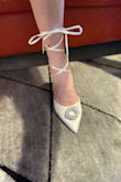 Wow! I loved the shoes online but when they arrived I was even more impressed with the ivory color and silky shoes to match my wedding dress. The only disappointment is that they run large! I wear an 8.5 and ordered an 8.5 because the 8.0 was out of stock. I didn't want to risk for the 8 to be too small so I decided to take the risk on 8.5 and figured I can pad the front of the shoes. I am still going to wear them! If you receive size 8 back in stock I'll probably order another pair. Thank you! I'm still very happy with the purchase. - Monika G.