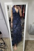 Love this dress, it is a wee bit loose around the waist but other than that golden. Probably only loose because I have a small chest. 130 lbs 5'7 34 A Ordered a XS. Dress fits like a glove, it is beautiful. - Jessica Z.