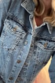 I'm obsessed with this Jean jacket! It fits perfectly & already feels like it's been broken into to. The length is great and it's not too heavy. I ordered the medium and it's a perfect fit. Buy this now! You won't regret it - Jennifer R.