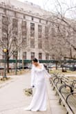 The wedding dress is simple, elegant, and beautiful. It came a little wrinkly, which is expected due to the fabric and transportation, but after ironing it was perfect. Even after wearing it all day was stunning. - Ingrid S.