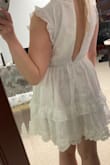 I love this dress! It zipped up with no problem my first time trying it on, but when I tried it on again to show my mom & fiancé we couldn't get the zipper past the waist seam. Not sure if I'll return it bc it zips fine off of me and I'm trying to lose weight so maybe after a few pounds it will zip easily. I am right in between M and L on the fit finder. - Annemarie R.