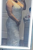Don't mind the back, I couldn't really tie it up all the way because I was alone. This was a pretty fit, but I wasn't a fan of the material's feel or design on it. - Azalie G.