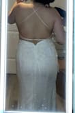 This dress is very beautiful, but it was too revealing for me and sadly it was really difficult to put on myself. Little small on the hips btw. - Azalie G.