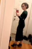 This is a very nice, flattering dress! I received many compliments. The material was thick and stretchy. It's also lined. I am a pear shape; my top half is a bit smaller. I would have gotten a better fit from an extra small on top but need the size small on the bottom. I had this dress taken in a good bit at the zipper under the arm pit. I feel there was definitely room for a more ample breast. My arms are thin and the sleeve was a little loose. As I'm petite, I had the sleeve shortened about an inch and the hemline shortened about 2 inches. (The photo at home was before alterations.) - Kasey B.