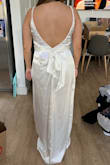 I really loved this dress and it was super slimming, but the back was just a bit too open for someone with a broad back that I didn't love the way it looked from behind. That was just a me issue though - there was nothing wrong with the dress itself and it was gorgeous! - Tara N.
