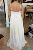 I wasn't sure about this dress when I bought it, but trying it on, it was super flattering and flowy! The material was nice and thick, and it was my favorite out of the three dresses I ordered from Lulus. I'm gonna wear this to my wedding reception! It might need a bit of a hem because it is pretty long on me, though. - Tara N.