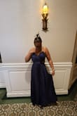 I wore this dress to a wedding and received many compliments. Unfortunately, right after the ceremony, the zipper broke and the only way to get free was to tear the zipper track. We had to use double-sided tape to seal the gap. Disappointing because the dress was flattering. - Cynthia B.