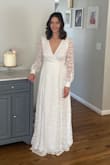 This dress fit perfectly for my 10 year anniversary vow renewal, couldn't have been more perfect! - Kerri K.