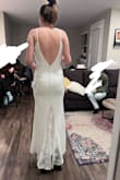 I love this dress! I plan to wear it to our backyard wedding this summer and think it will be perfect. Fits well, not too thick but isn't too thin either. The back is so pretty, small train but just enough of a fun lace detail. - Laura C.