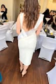 I bought this dress for my courthouse wedding next year! The quality of the dress is great! I love the open back. I will definitely have to wear nude underwear or white and get it hemmed since I'm short. Can't wait! - Lucia A.