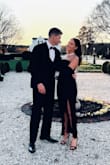 I honestly love this dress. I didn't have any issues with it staying up. Quality material, and not the type of material that makes lint and hair stick to it.  Perfect length. It's comfy and there's no gapping in the back. I ordered the XS in black and wore it to a formal event. Great dress! - Shannen L.