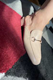 So, I dislike when reviews are not thorough so I hope this helps lol! This shoe will elevate any outfit whether you're going for a chic business casual or literally wearing these to the office. The gold piece on top makes the shoe look that much more elegant and clean and it's really sturdy and stuck onto the shoe so it does not look cheap. This shoe is very much true to size so if you order your actual size, your heel should meet the end of the shoe - nothing more, nothing less. I am a true size 9 and an 8.5 in sneakers like Adidas. I did read a review about the shoe squeaking, it does not squeak at all unless you do not wear socks (yea there are special half socks for these kinds of shoes) which is to be expected when bare skin sweats in leather or plastic. The shoe's heel does make a loud clacking sound which I personally really love, but I am very extra lol. The heel adds about an inch more to you. The actual shoe itself has a lot of room for your toes, however, if you have wider feet I would not recommend - Kroeksak O.