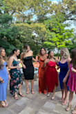 The dress looks better in person than it does in pictures! The material is not stretchy so I sized it up to small. The dress is very comfortable and it looks great! - Paulina I.