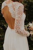 This dress turned out to be the perfect wedding dress for me. It was everything I wanted. I did have to get it altered, but that is typical for a wedding dress. LOVE! - Baylee S.